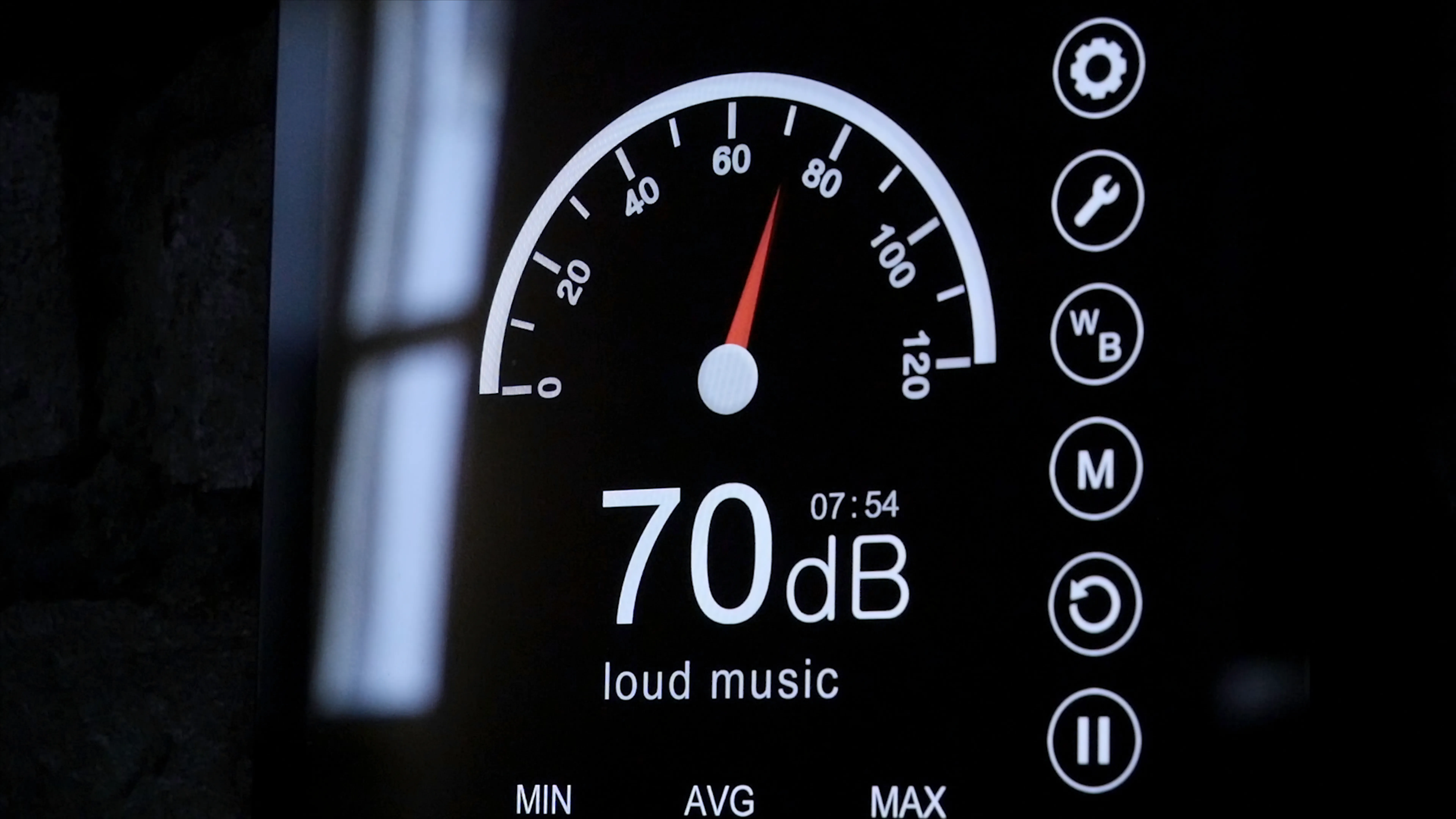Close-up of sound level meter screen in decibels