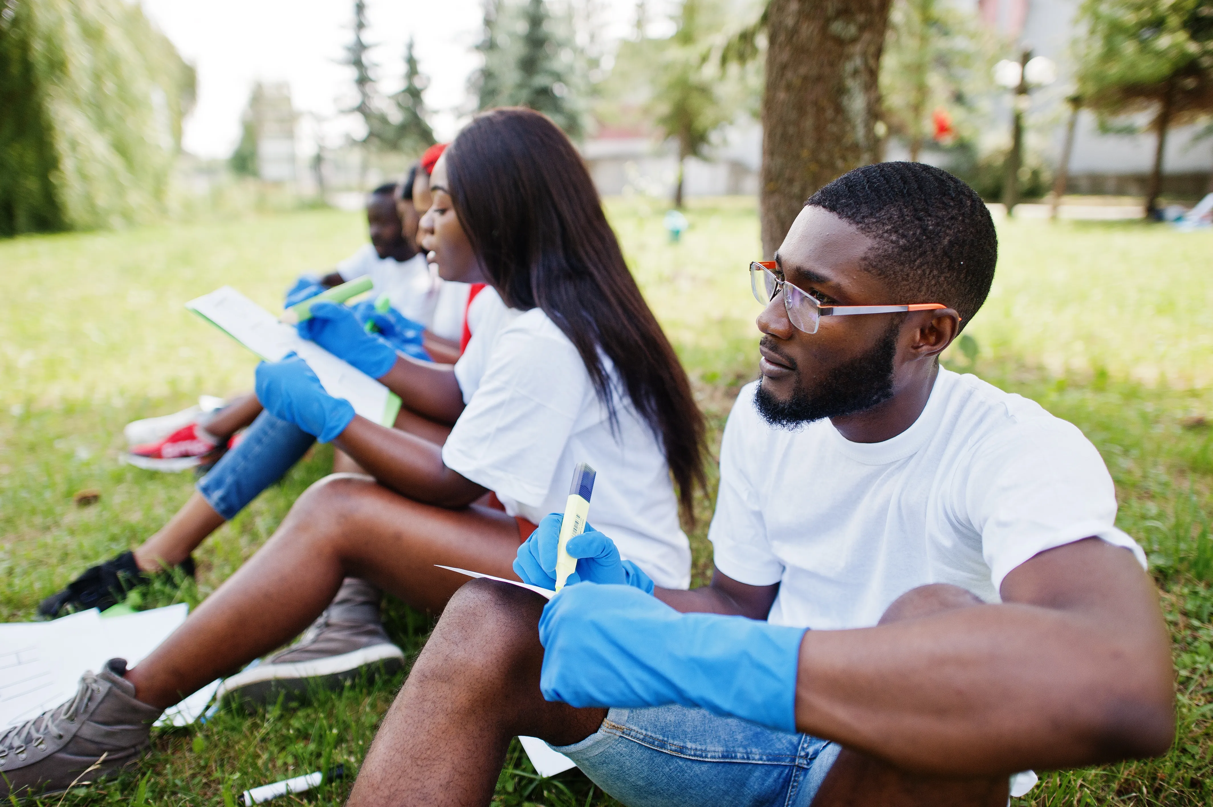 African community volunteers working together on an environmental sustainability project