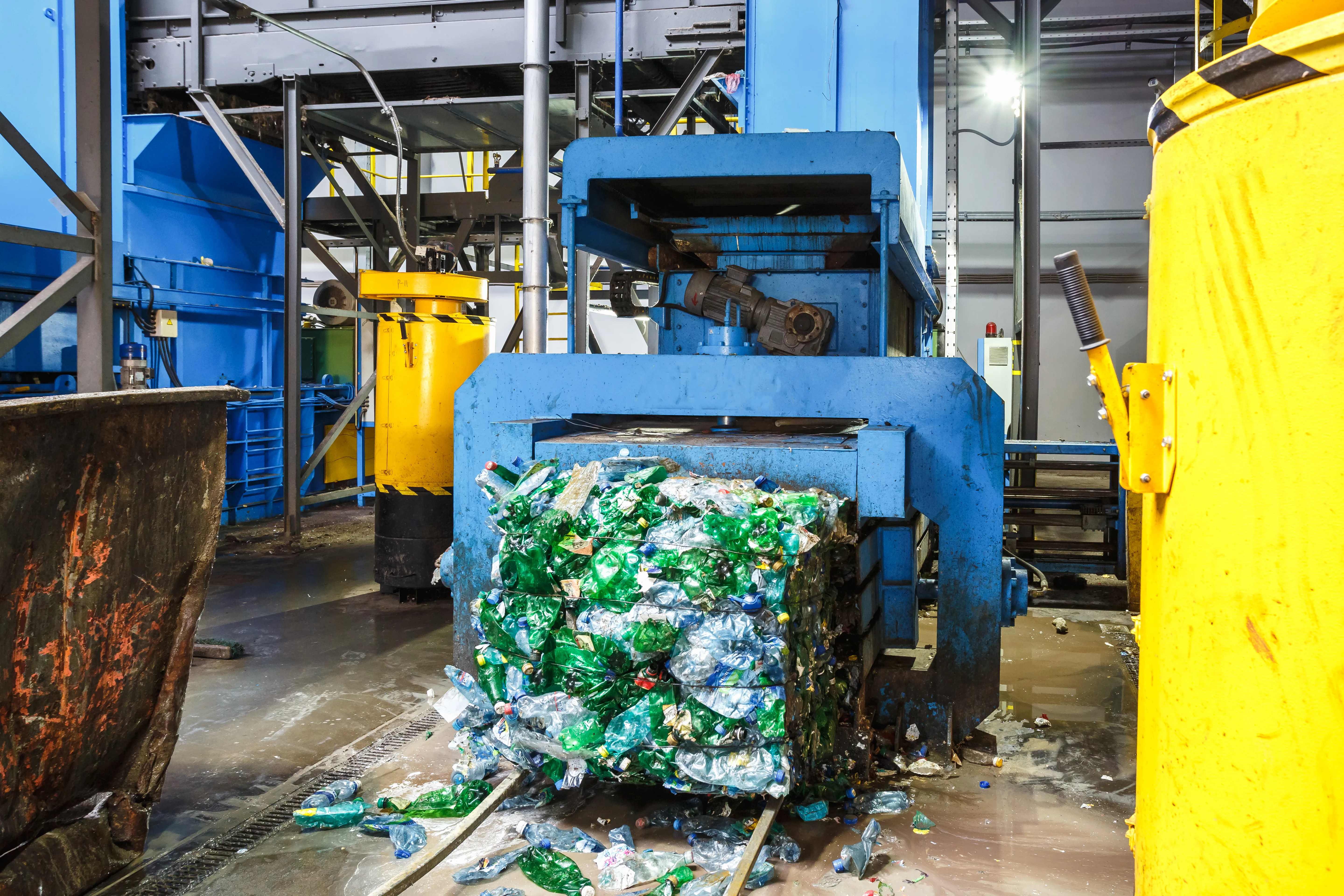 Separated waste materials for recycling demonstrating environmental compliance
